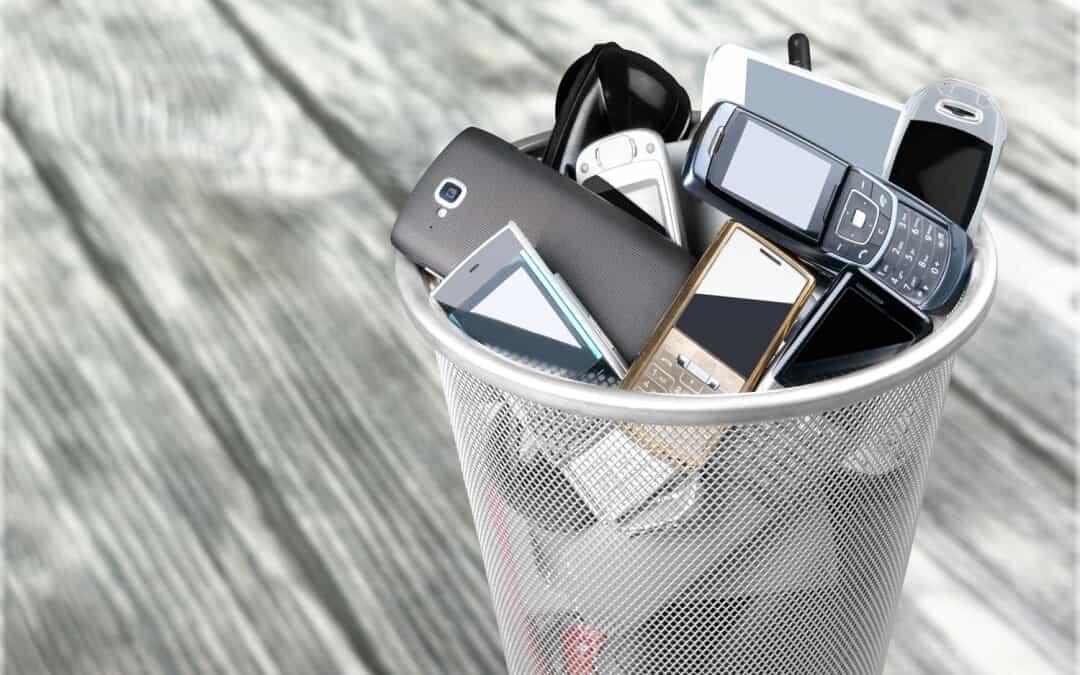 Silver trash can full of cell phones