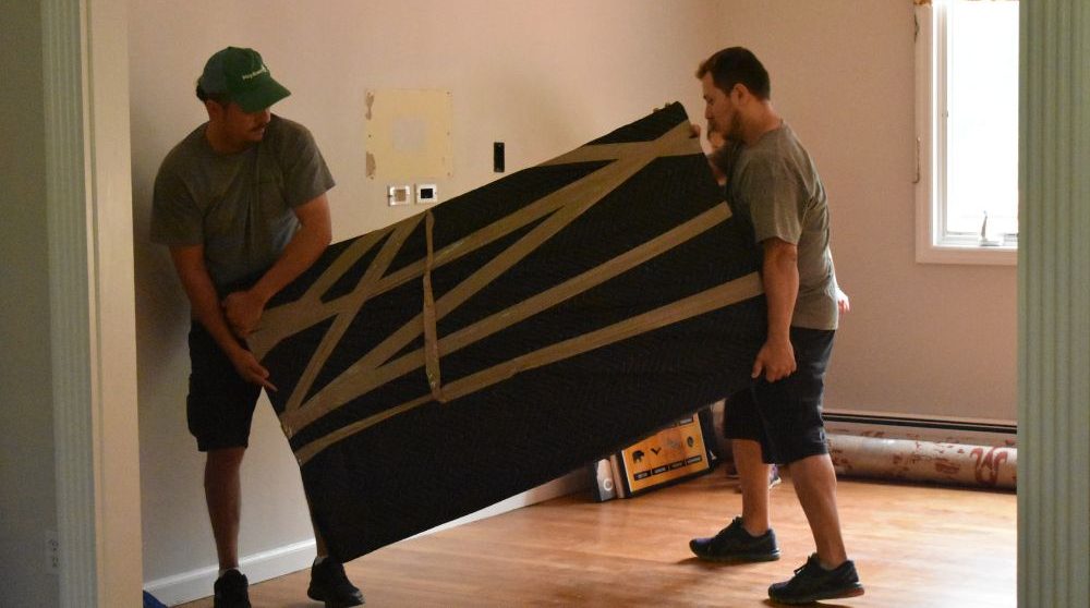 Murphy movers handling the furniture move safely