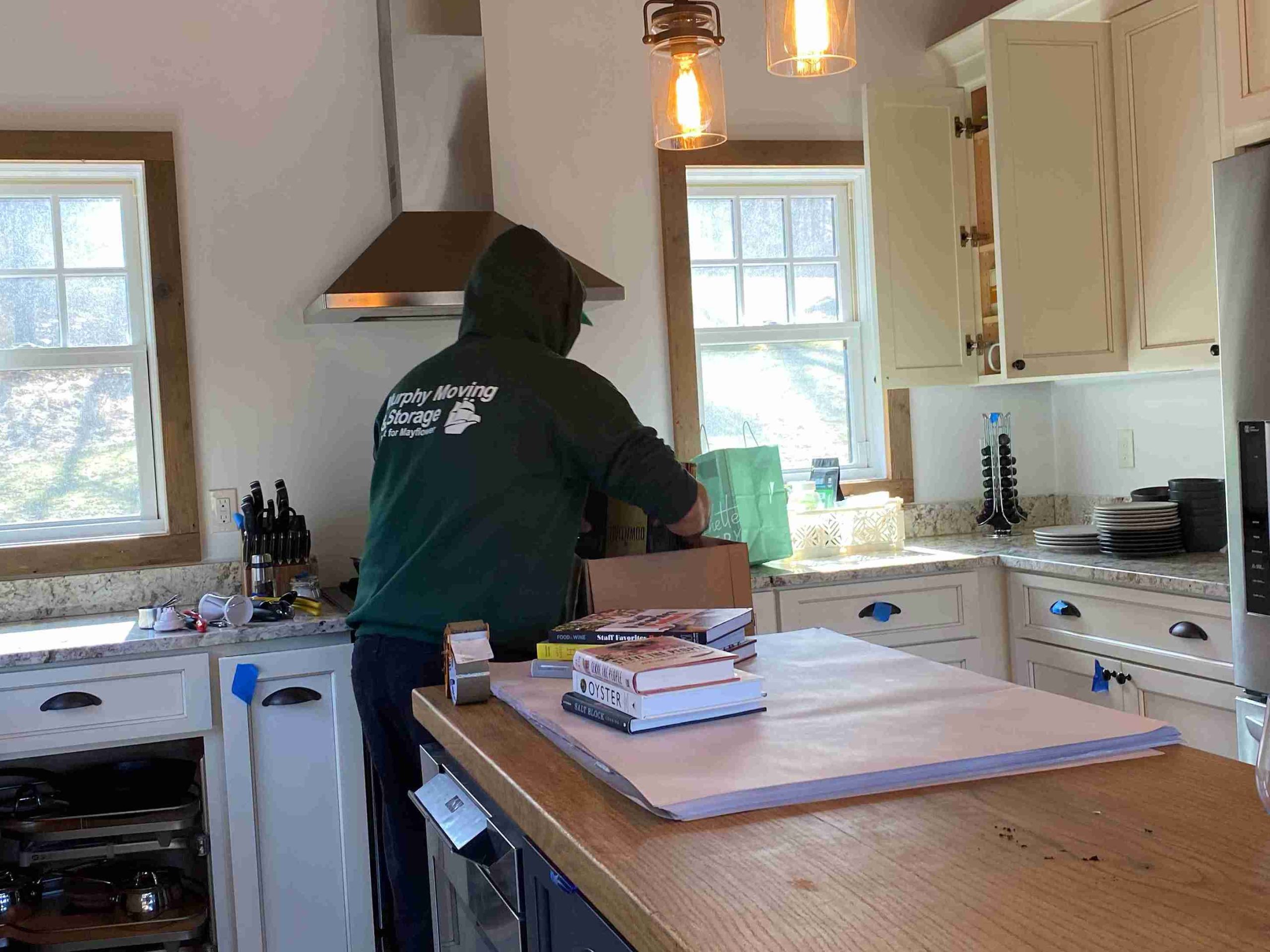 man carefully packing the items