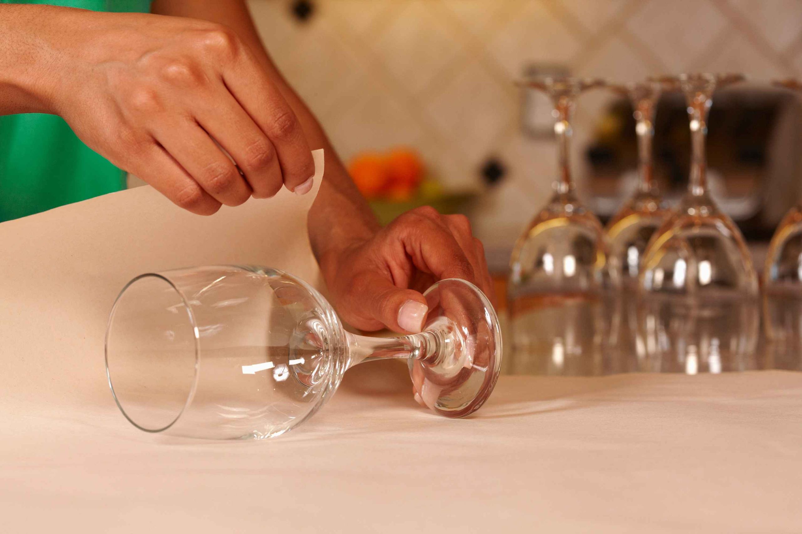 close up packer wrapping the wine glass