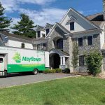 moving truck parked out side of the house