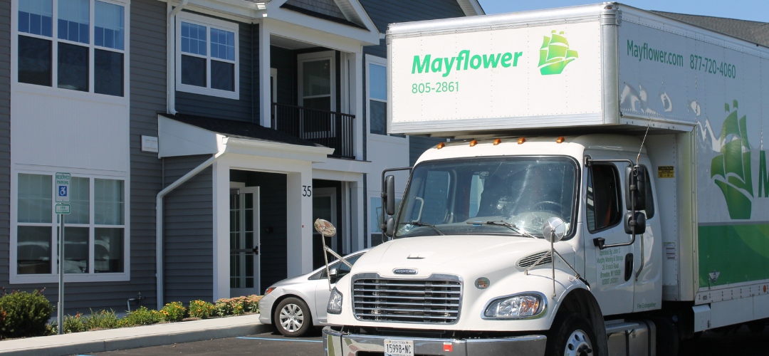 A white Mayflower moving truck