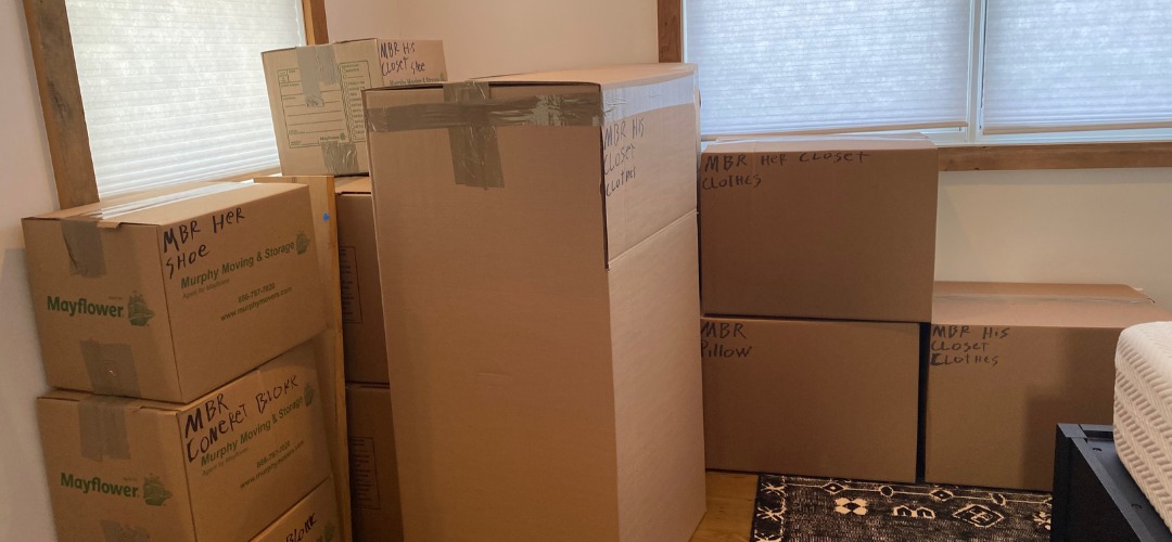 stacked cardboard moving boxes