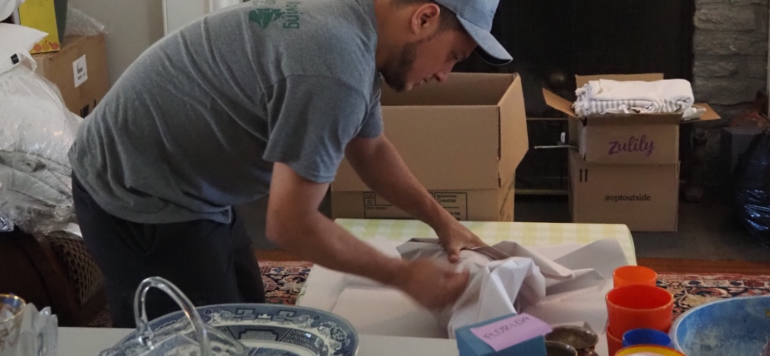 A mover wraps household items