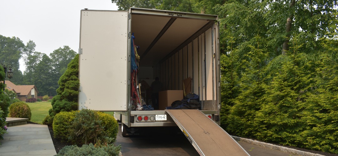 Rear view of an open moving truck cargo bay