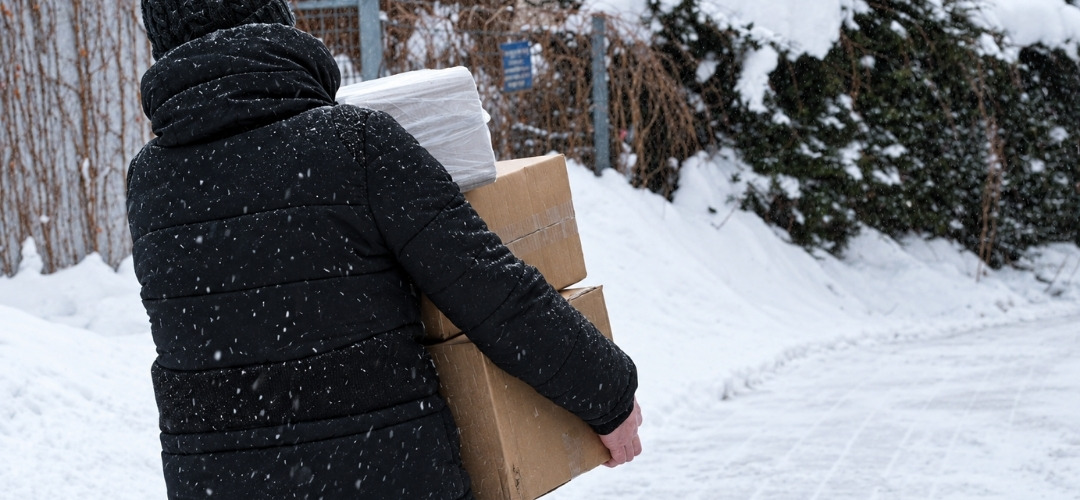 carrying cardboard boxes